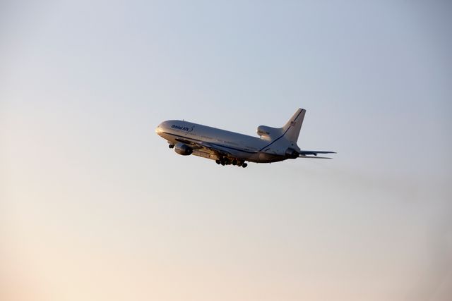 The Orbital ATK L-1011 Stargazer is seen flying after takeoff from Cape Canaveral Air Force Station, Florida, carrying a Pegasus XL Rocket. The payload onboard aims to gather satellite data to improve the accuracy of measuring ocean surface winds during tropical storms and hurricanes. Ideal for content related to aerospace technology, NASA missions, satellite deployment, or hurricane research.