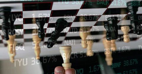 Holding ivory king above mirrored chessboard with stock market ticker overlay