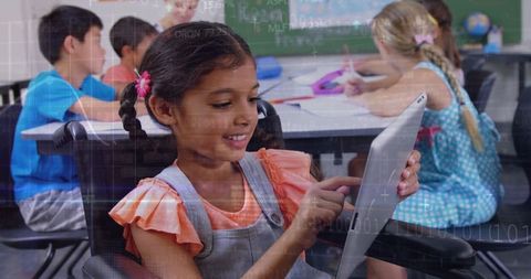 Schoolchildren Engaged with Digital Learning in Classroom with Tablet