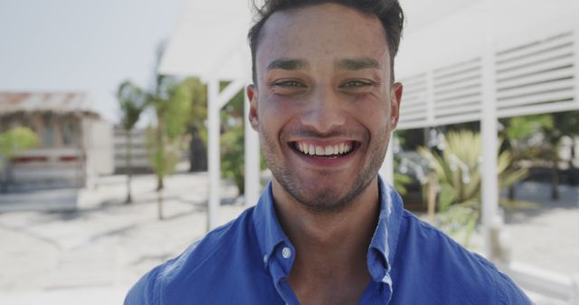 Smiling Young Man Enjoying Sunny Day Outdoors - Download Free Stock Images Pikwizard.com