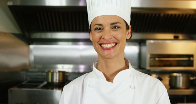 Woman cook posing in a restaurant