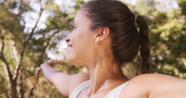 Smiling Woman Practicing Yoga Outdoors in Sunny Park - Download Free Stock Images Pikwizard.com