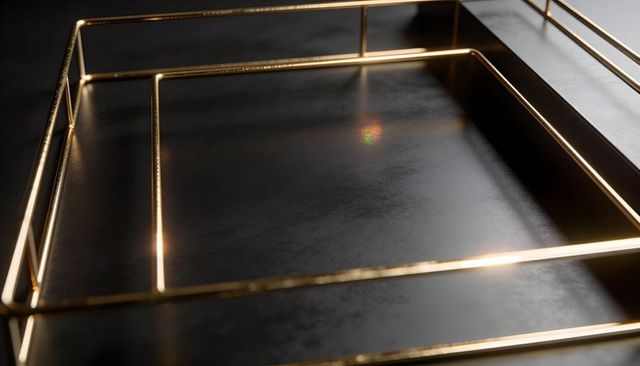 Nested gold metal rails on dark matte surface with glowing highlights and prismatic flare