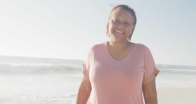 Smiling African American Woman Enjoying Beach Day - Download Free Stock Images Pikwizard.com