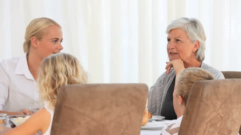 Multigenerational Family Enjoying Meal Together