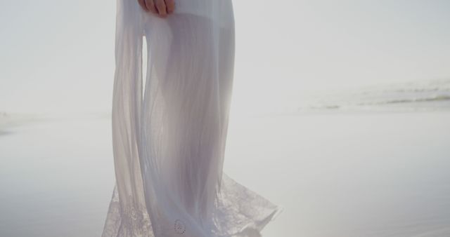 Woman in Flowing White Dress by Beachside - Download Free Stock Images Pikwizard.com