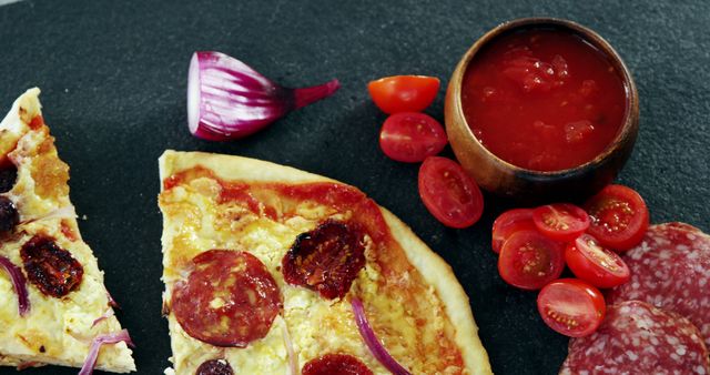 Slices of Pepperoni Pizza with Cherry Tomatoes and Sauce on Slate - Download Free Stock Images Pikwizard.com