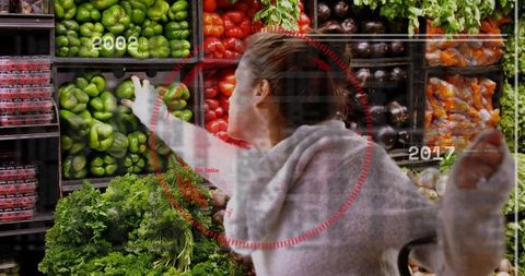 Woman reaching for green peppers in grocery produce aisle with retro year overlay