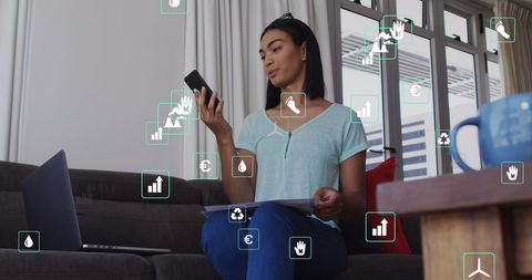 Woman Using Smartphone with Digital Ecology Icons Overlay