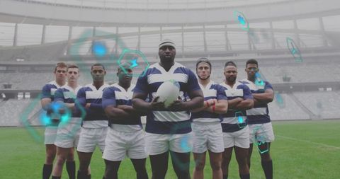 Rugby team posing with captain holding ball and hex tech overlays in stadium