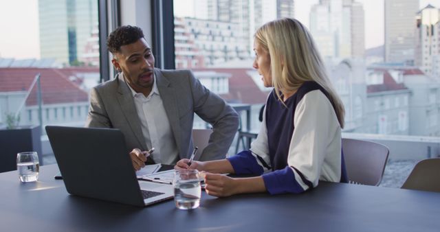 Two Business Professionals Having a Meeting in Modern Office - Download Free Stock Images Pikwizard.com