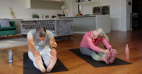 Senior Couples Exercise Flexibility with Home Yoga Routine