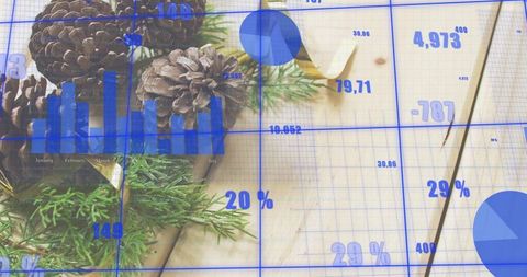 Displaying pinecones and evergreen sprigs overlaid with blue analytics grid on rustic wood