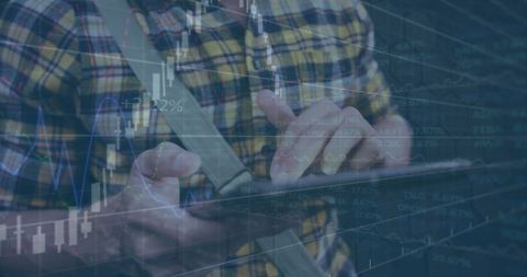 Digital Stock Analysis Concept with Man Using Tablet