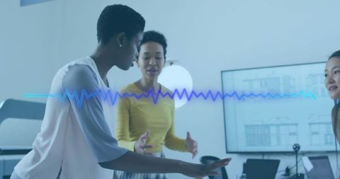 Collaborative Team Meeting with Visual Waveform in Modern Workspace