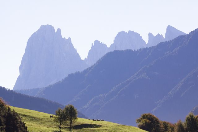 Majestic Mountain Range with Rolling Green Hills - Download Free Stock Photos Pikwizard.com