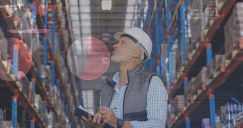 Warehouse Worker Analyzing Data Innovation in Large Storage Facility - Download Free Stock Images Pikwizard.com