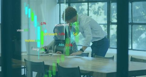 Business Team Analyzing Financial Data with Augmented Charts in Modern Office Meeting