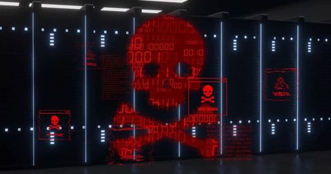 Red skull malware projection glowing over server racks in dim neon data center corridor