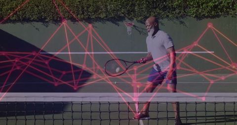 Senior Man Playing Tennis with Futuristic Overlay