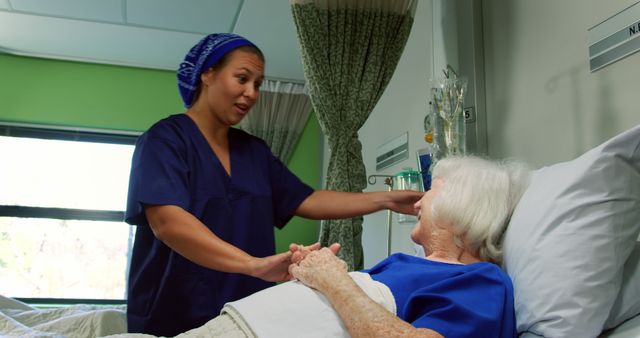 African American Nurse Consoling Senior Patient in Hospital Ward - Download Free Stock Images Pikwizard.com