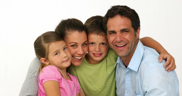 Happy Family Smiling and Embracing in Casual Clothing - Download Free Stock Images Pikwizard.com