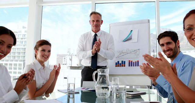 Business Team Applauding During Successful Presentation in Modern Office - Download Free Stock Images Pikwizard.com