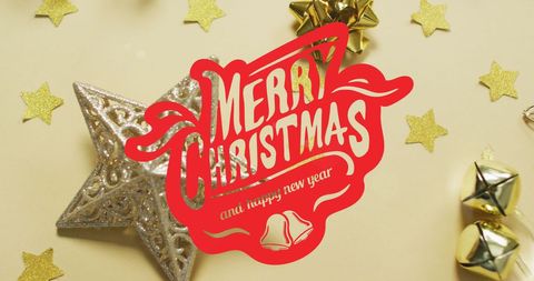Festive Merry Christmas Text with Holiday Decorations on Yellow Background
