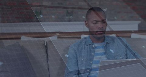 Modern Living Room with Holographic Grid and Focused Man