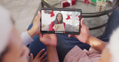 Couple Video Calling for Christmas with Festive Tones