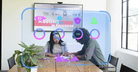Business collaboration with augmented analytics overlays reviewing documents in office