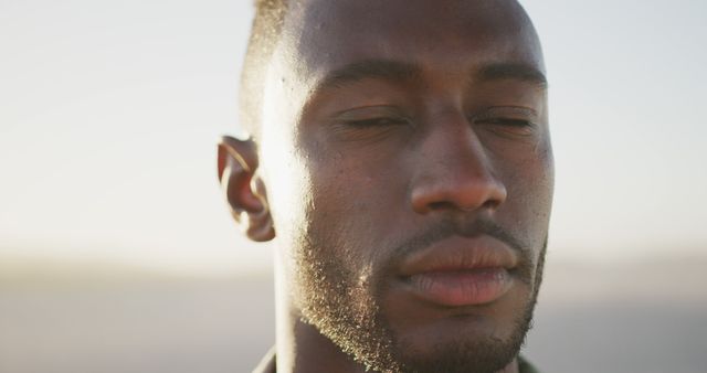 Serene Young African American Man With Closed Eyes in Contemplation - Download Free Stock Images Pikwizard.com