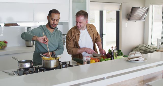 Friends Cooking Together in Modern Kitchen Preparing Meal - Download Free Stock Images Pikwizard.com