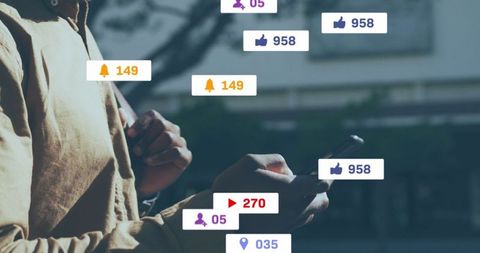 Person Engaged with Social Media on Smartphone in Urban Environment