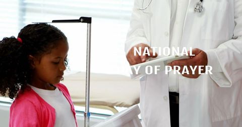 National day of prayer: doctor and child in prayerful environment