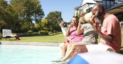 Seniors Enjoying Leisurely Poolside Gathering