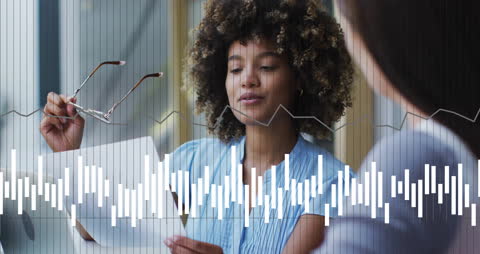 Diverse Businesswomen Analyzing Work with Digital Interface