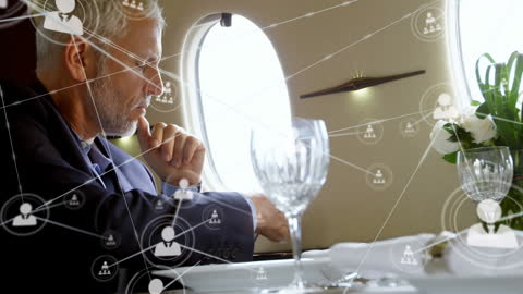 Businessman Using Smartphone with Digital Network Overlay on Plane