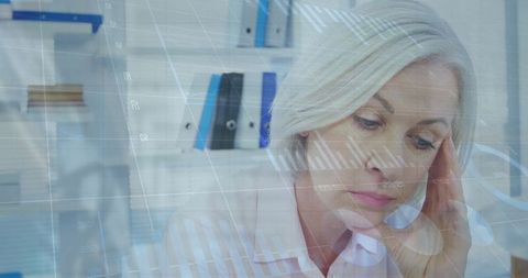 Stressed Businesswoman Analyzing Financial Data