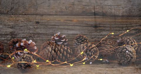 Rustic Pine Cone Christmas Decoration on Wooden Background - Download Free Stock Images Pikwizard.com