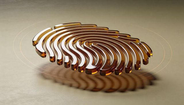 Floating amber fingerprint sculpture with concentric rings, minimal abstract design