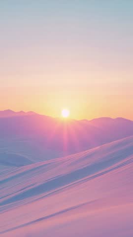 Vertical sunrise over snow dunes casting pastel pink glow across alpine ridges