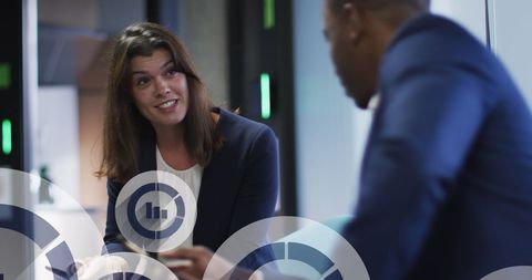 Business Colleagues Discussing Data with Digital Interface Overlay