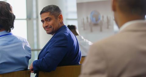 Caucasian Businessman Smiling at Seminar Back View - Download Free Stock Images Pikwizard.com
