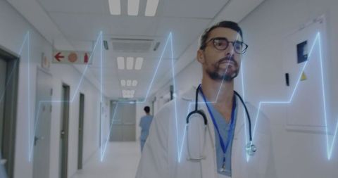 Doctor Analyzing Digital Heartbeat Data in Hospital