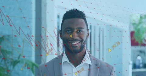 Smiling executive in light gray blazer posing in office with augmented reality data overlay