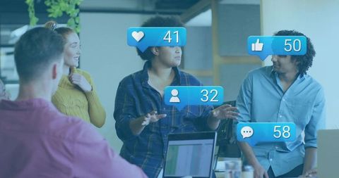 Diverse Team Engaging in Creative Brainstorming Session with Media Metrics