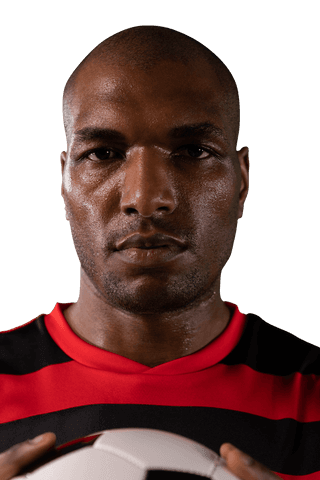 Focused football player holding ball on transparent background