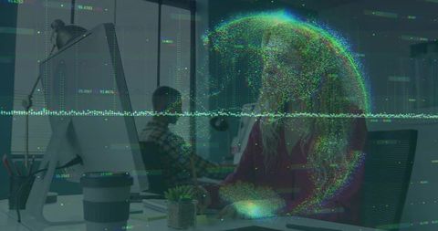 Woman in magenta sweater working at desk holding pencil with holographic globe data overlay