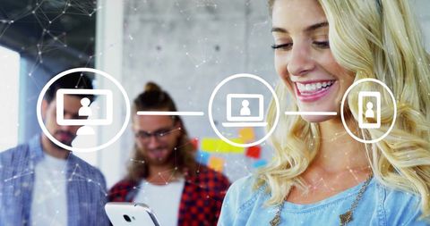 Smiling woman using smartphone with digital communication graphics